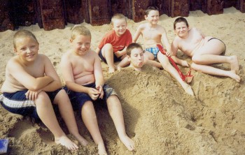 The six cousins having fun on the beach at St. Andrews.