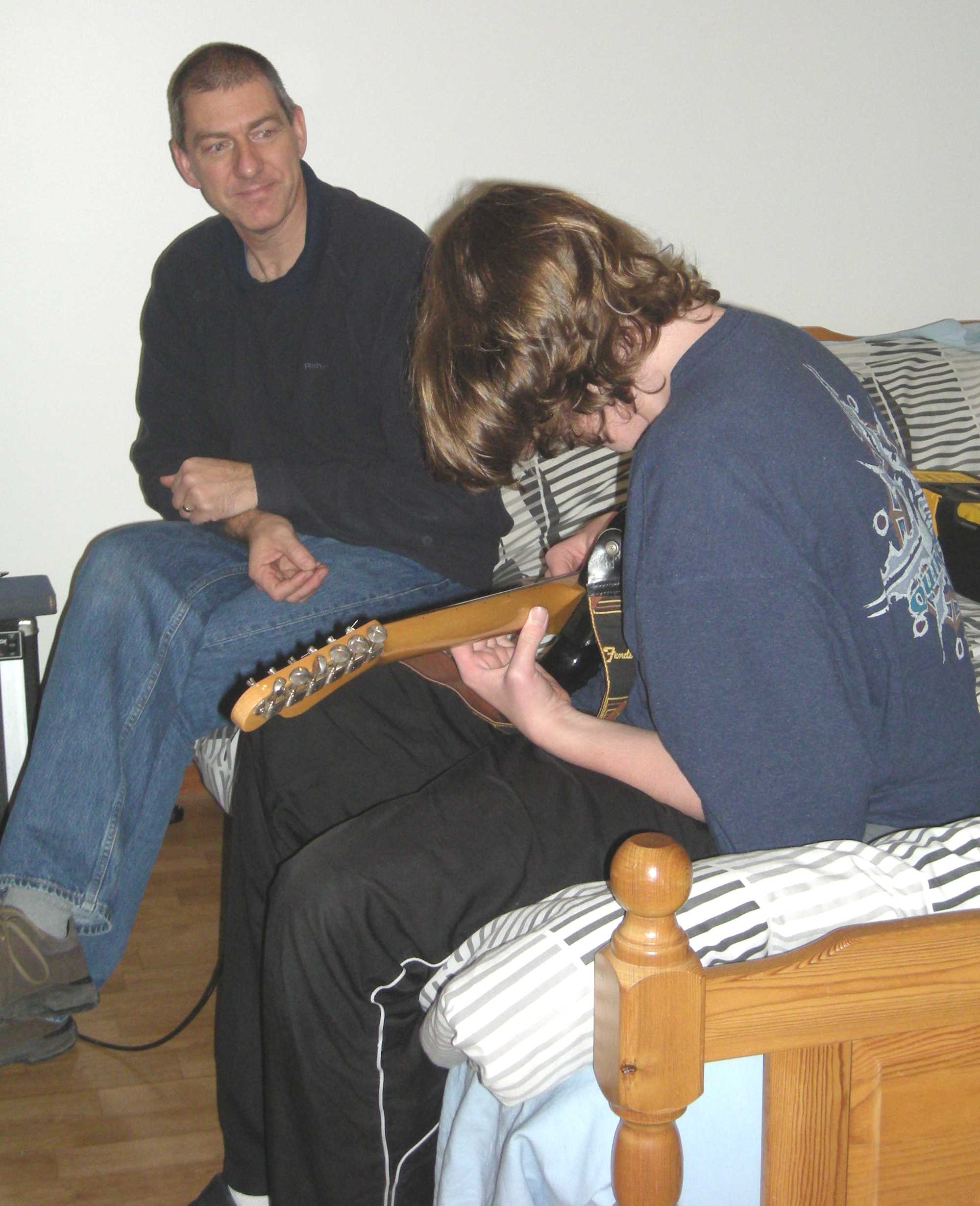 Ben with his birthday present an electric guitar